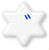 ゛